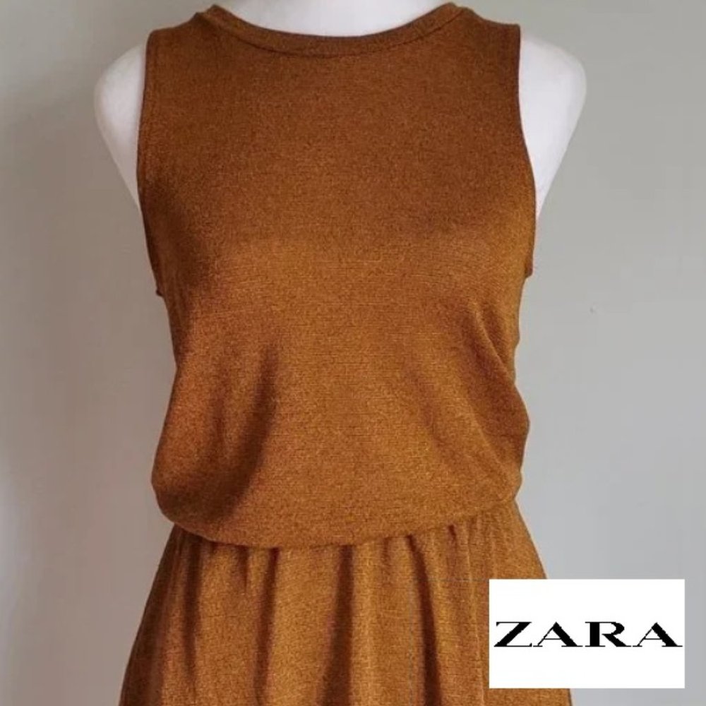 Asymmetrical Hem Sleeveless Peplum Top / Mini Dress Lightweight Stretch Knit